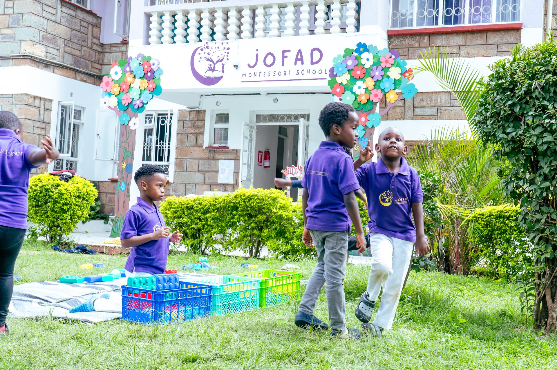 Children playing with Montessori materials at Jofad School